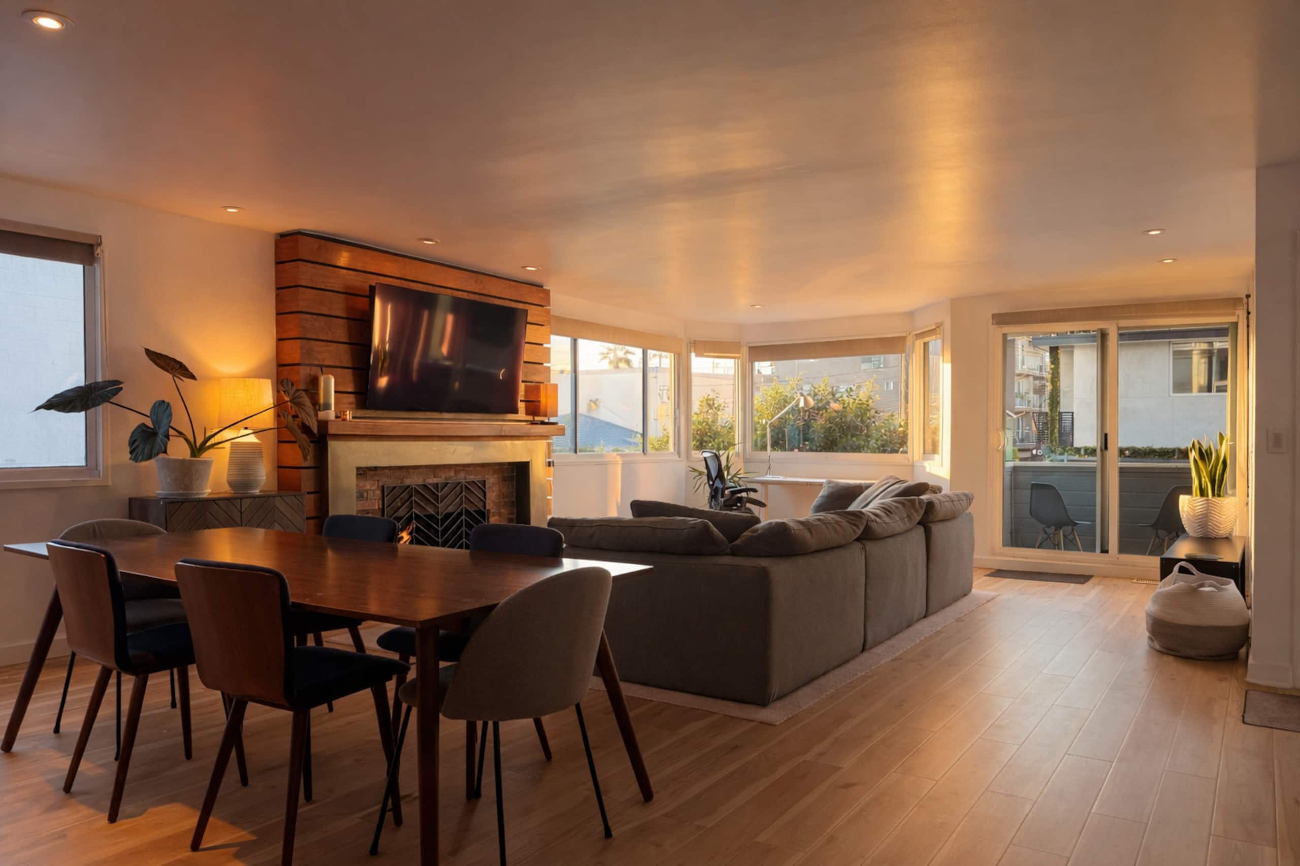 Living room with fireplace and ocean view